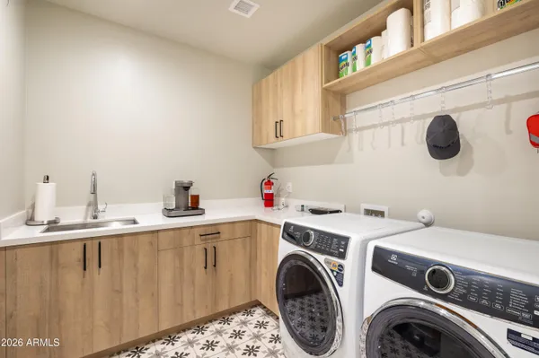 a view of a swimming pool with an outdoor space and seating area