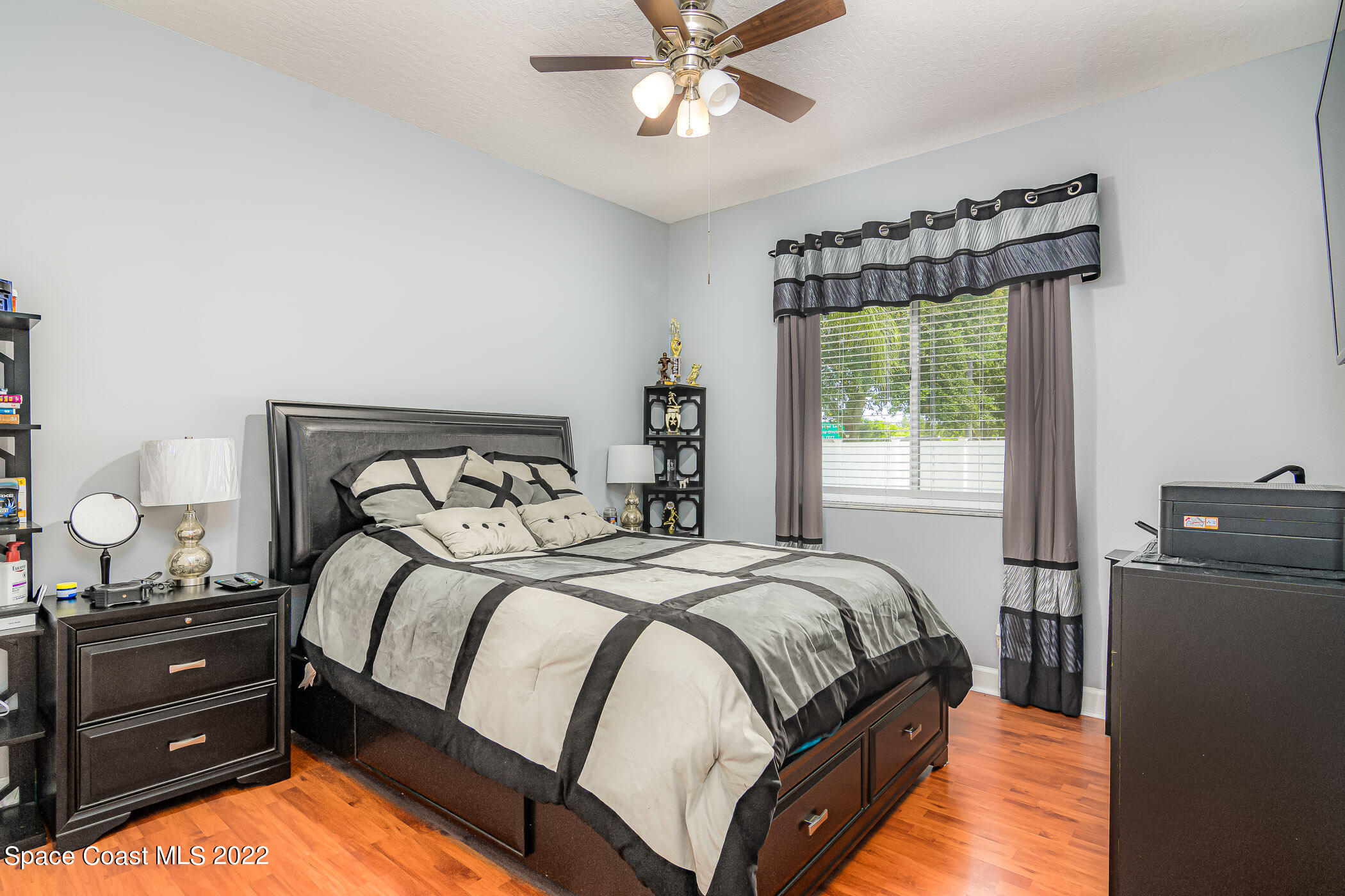 3832 Stream Drive Melbourne, FL 32940 - Photo 26 of 63 a bedroom with a bed and a window