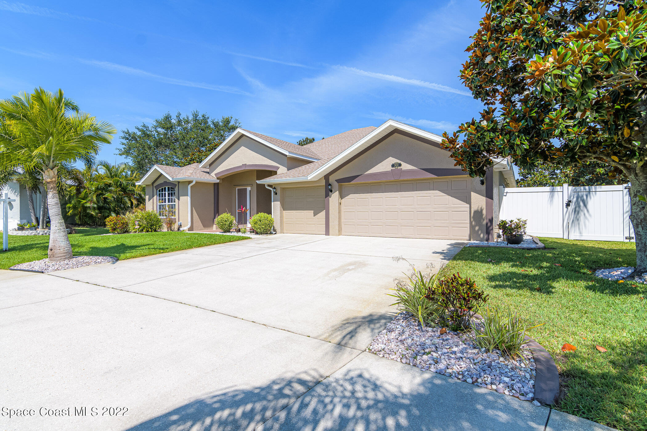 3832 Stream Drive Melbourne, FL 32940 - Photo 45 of 63 a front view of a house with garden