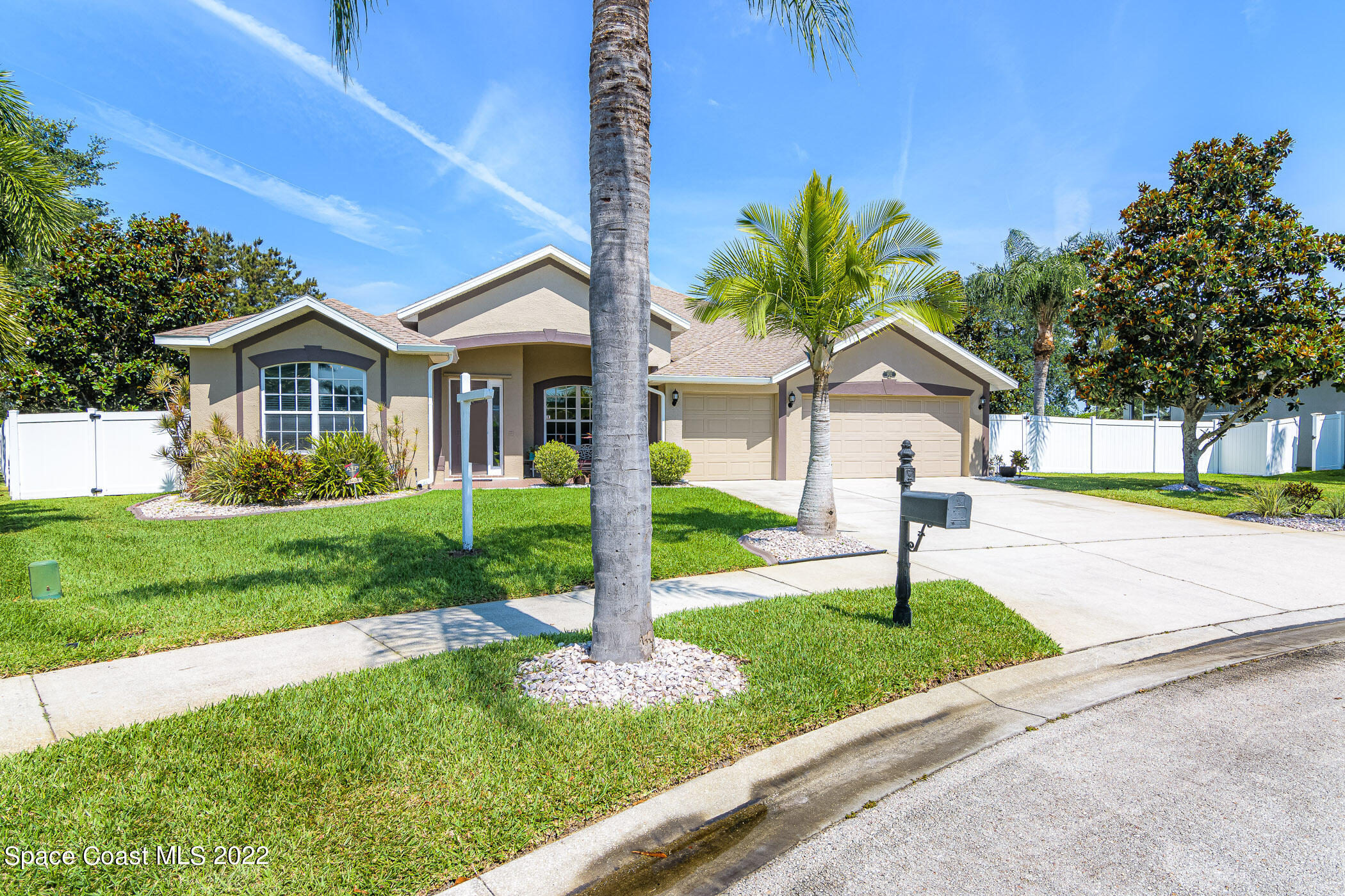 3832 Stream Drive Melbourne, FL 32940 - Photo 47 of 63 a front view of house with yard and green space