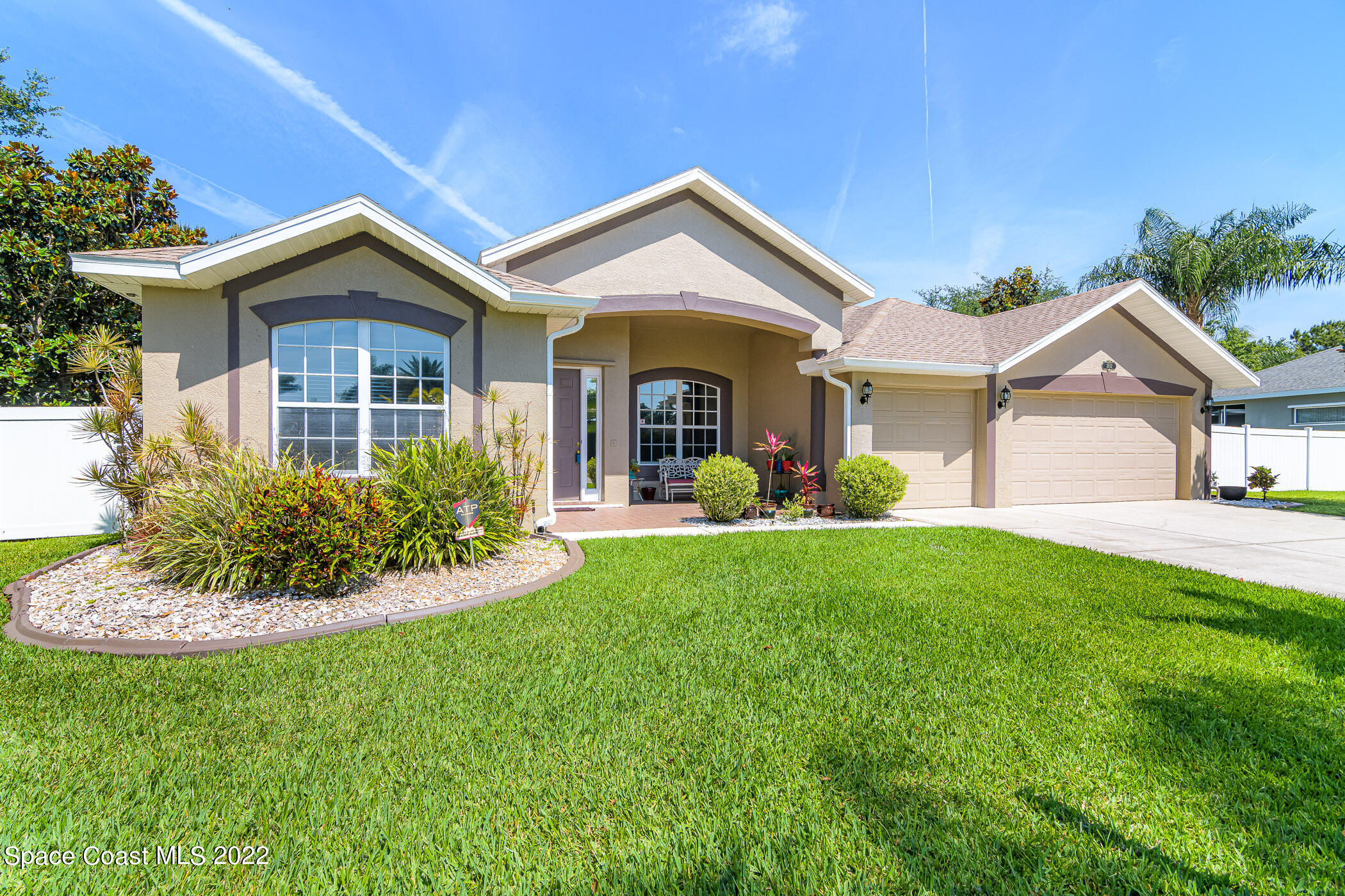 3832 Stream Drive Melbourne, FL 32940 - Photo 50 of 63 a view of a house with a yard and potted plants