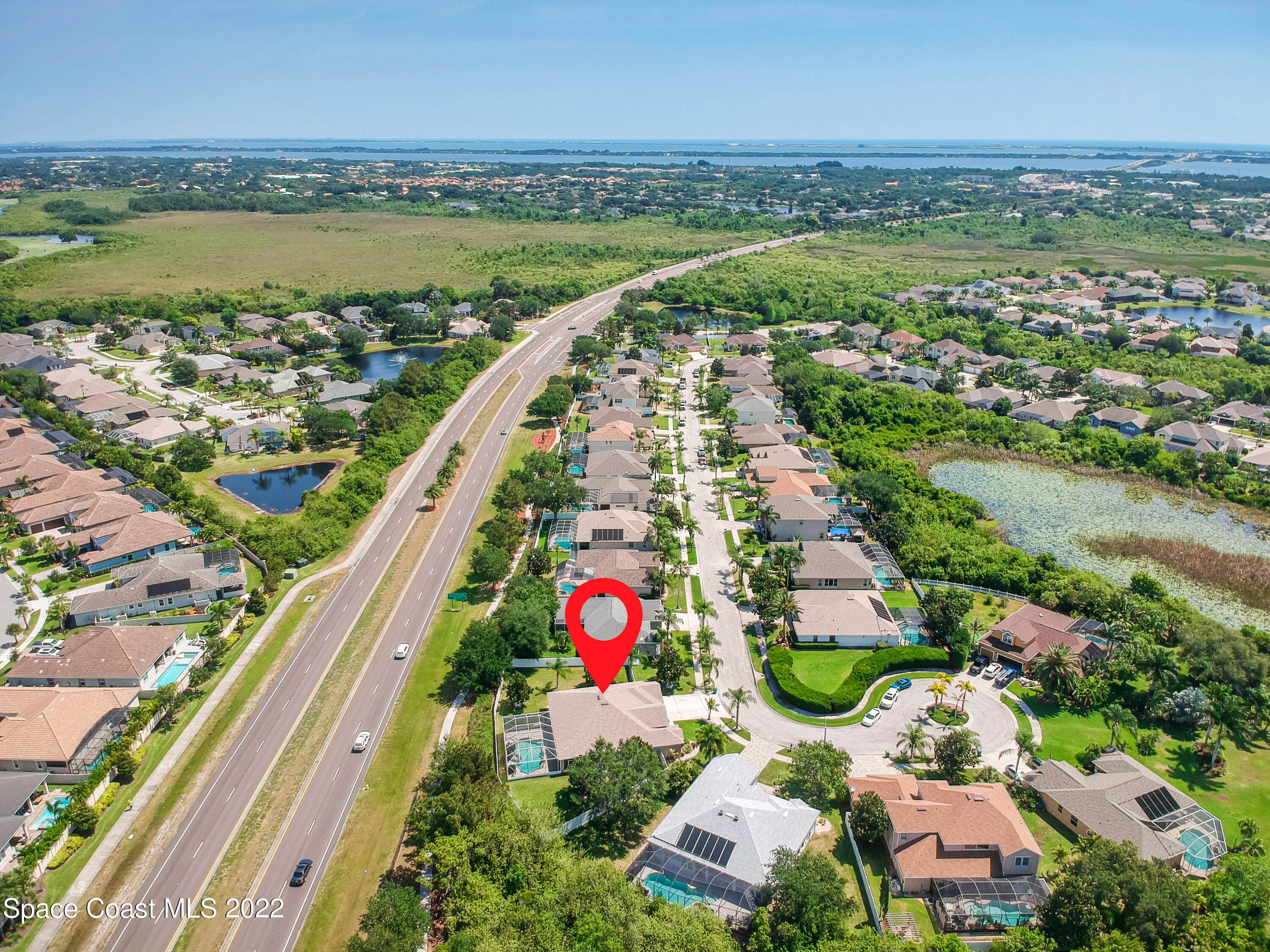 3832 Stream Drive Melbourne, FL 32940 - Photo 5 of 63 an aerial view of residential houses with outdoor space