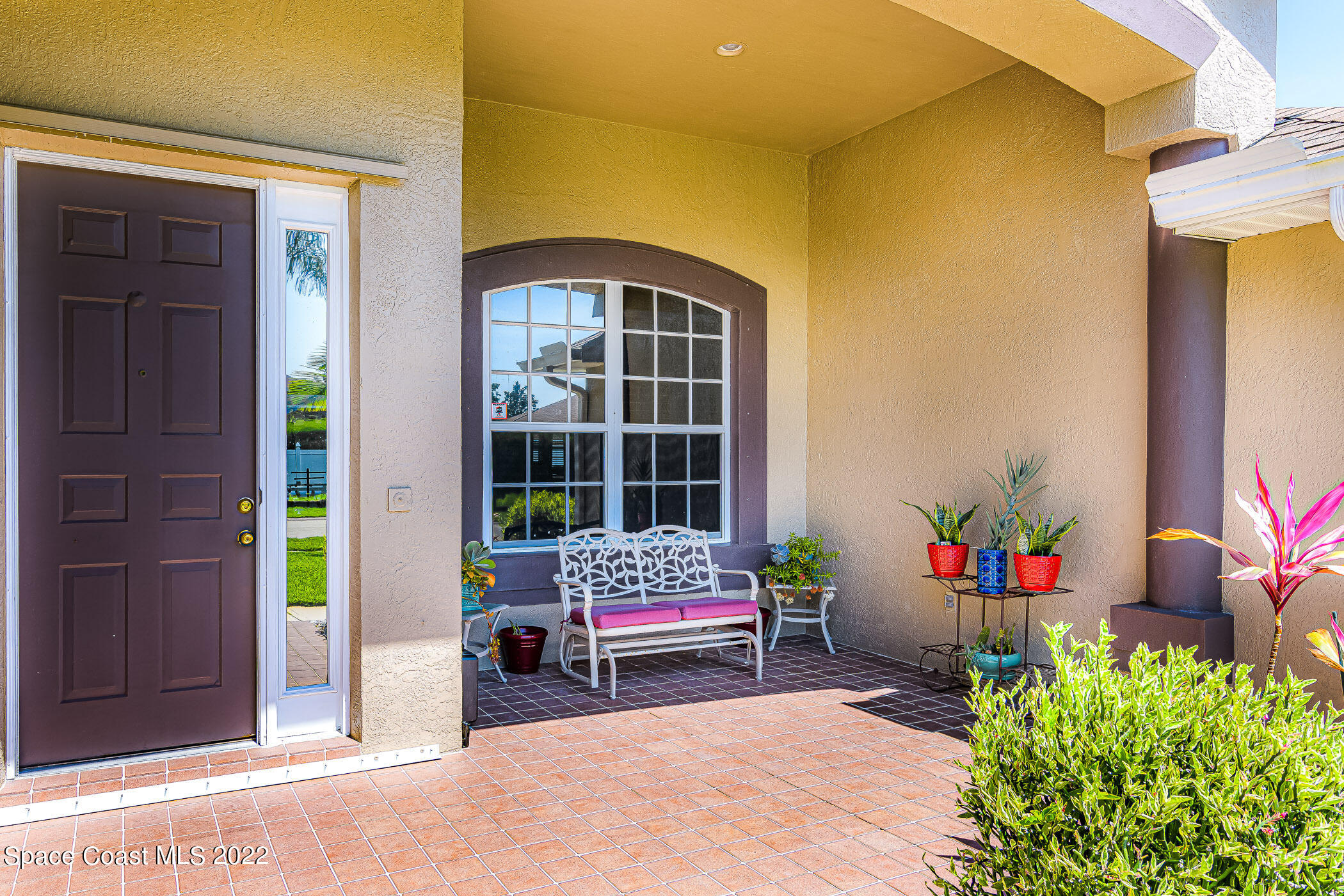 3832 Stream Drive Melbourne, FL 32940 - Photo 53 of 63 a house view with a sitting space and garden space