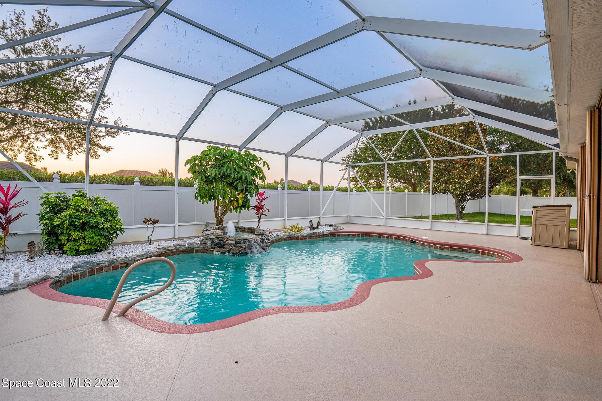 3832 Stream Drive Melbourne, FL 32940 - Photo 59 of 63 a view of a house with backyard and sitting area