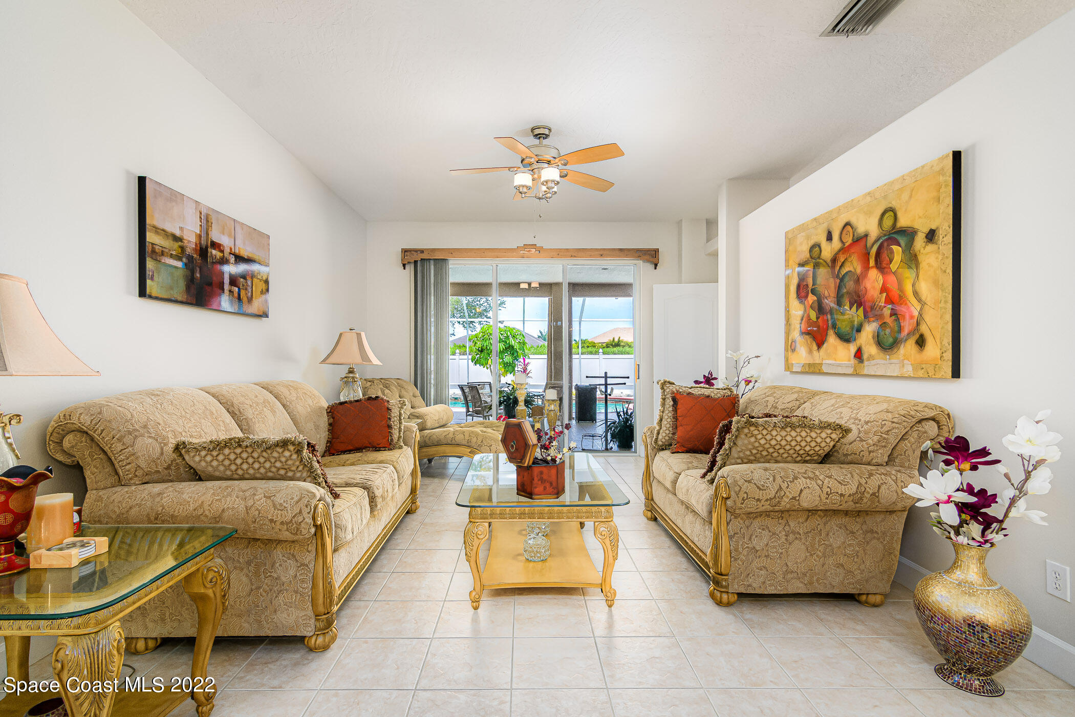 3832 Stream Drive Melbourne, FL 32940 - Photo 7 of 63 a living room with furniture and a large window
