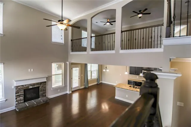 a view of a livingroom with furniture and a fireplace