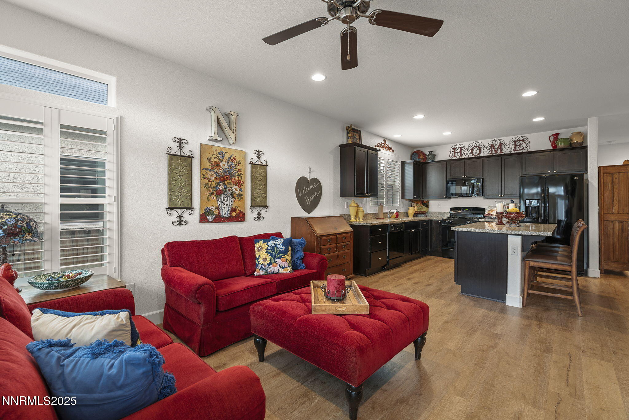 985 Floral Ridge Way Sparks, NV 89436 - Photo 14 of 24 a living room with furniture kitchen view and a window