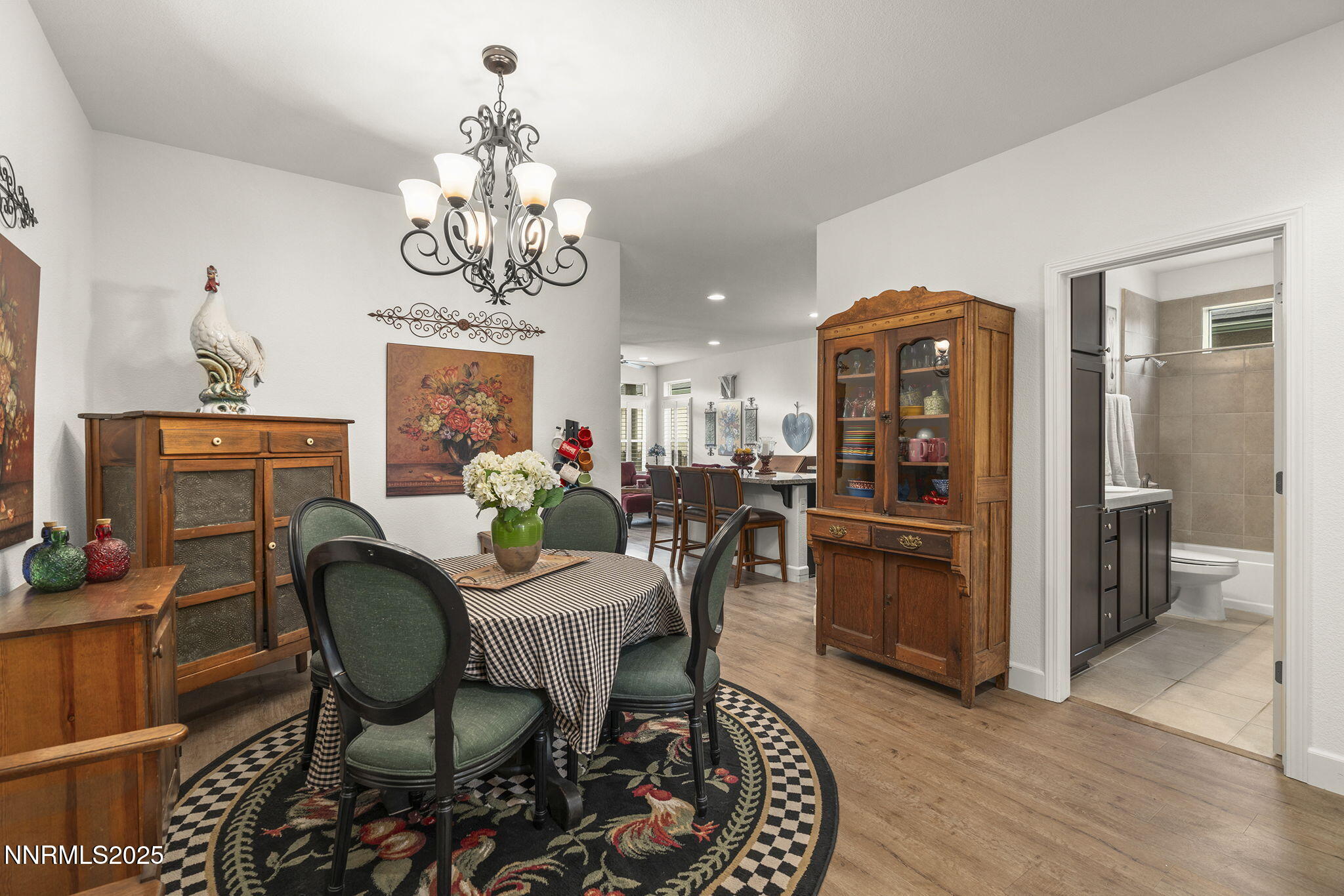 985 Floral Ridge Way Sparks, NV 89436 - Photo 5 of 24 a view of a dining room with furniture and chandelier