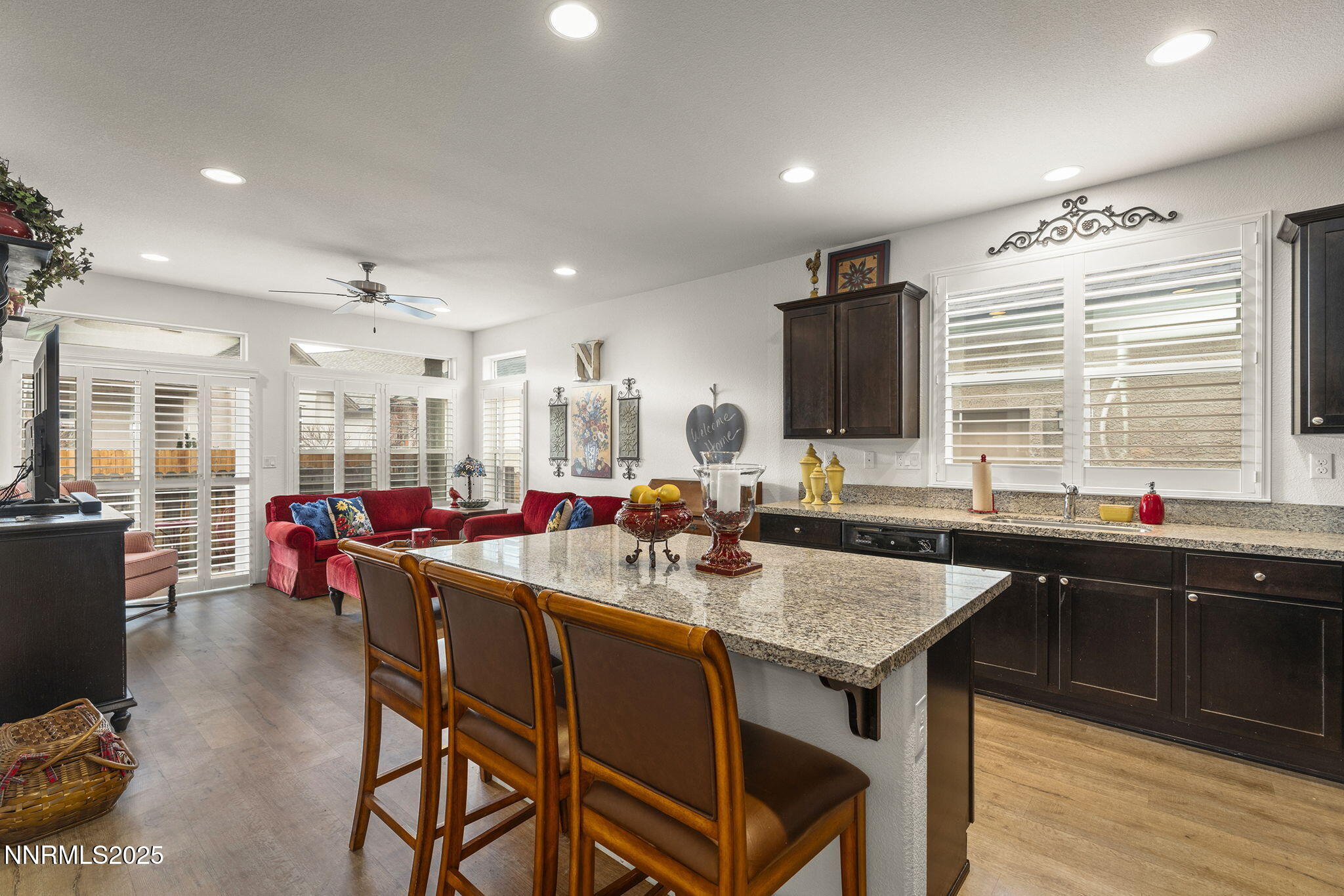 985 Floral Ridge Way Sparks, NV 89436 - Photo 8 of 24 a kitchen with a sink dining table and chairs