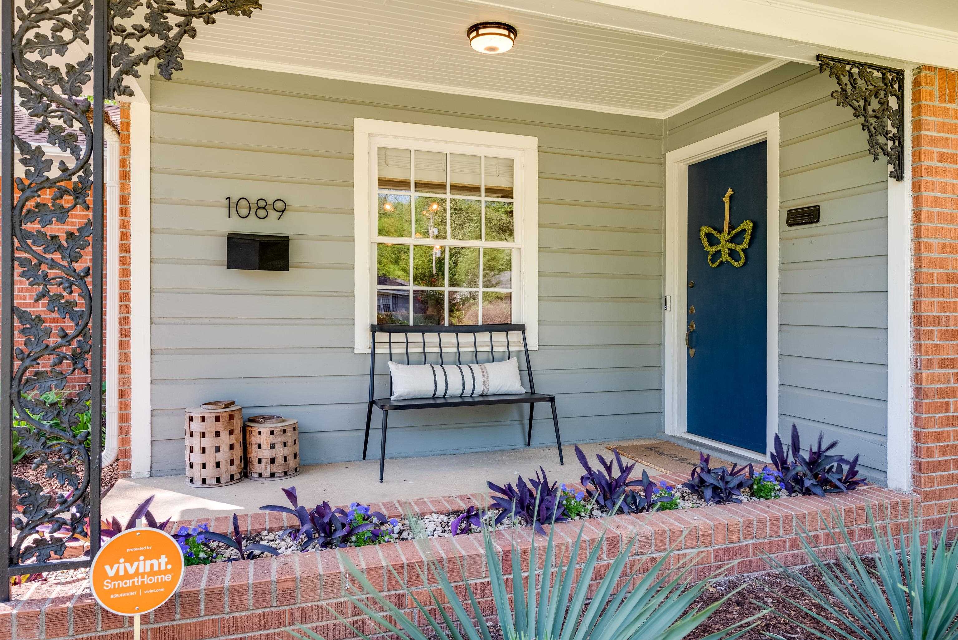 1089 West Perkins Road Memphis, TN 38117 - Photo 2 of 25 a front view of a house with outdoor seating