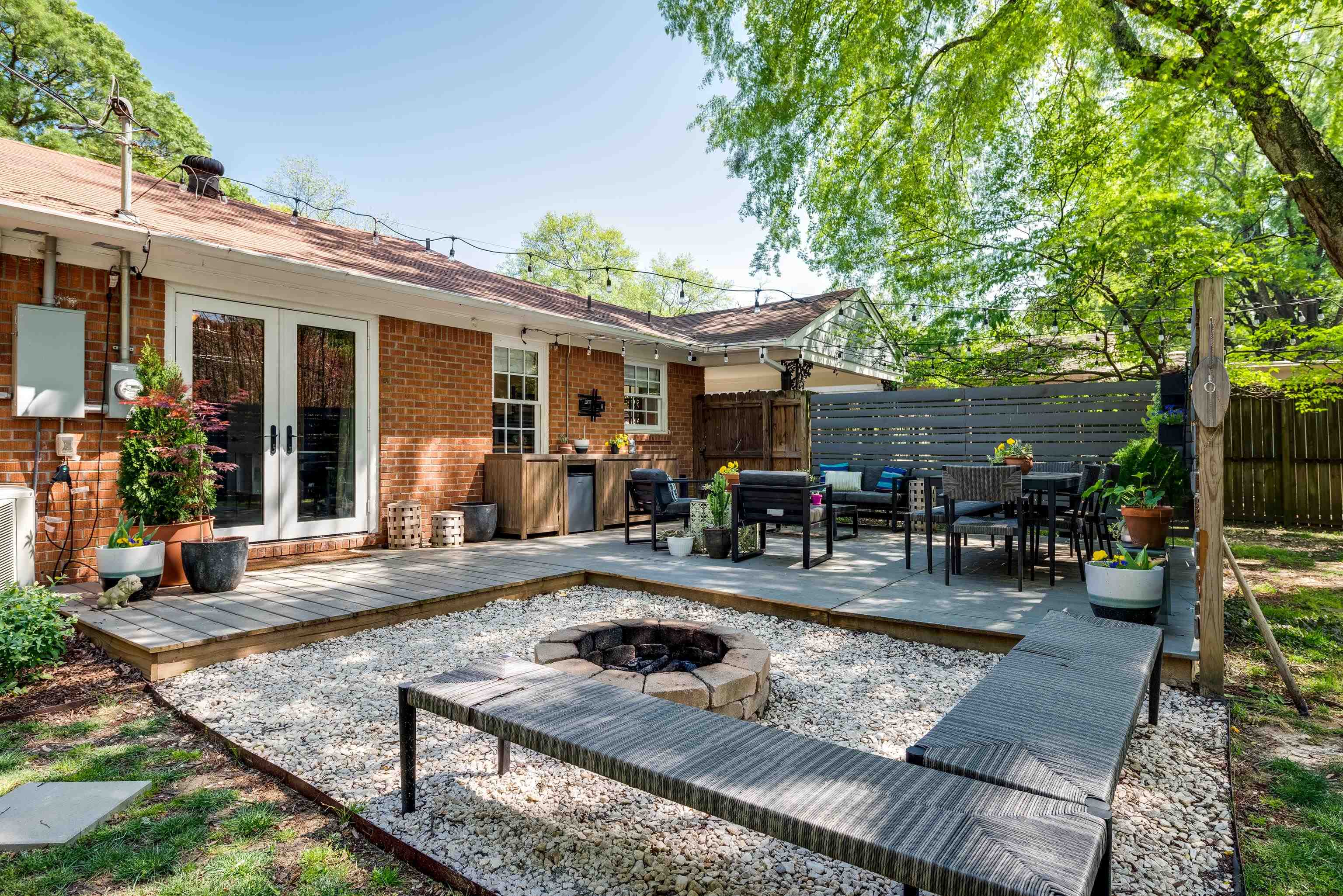 1089 West Perkins Road Memphis, TN 38117 - Photo 24 of 25 a view of a house with backyard porch and sitting area