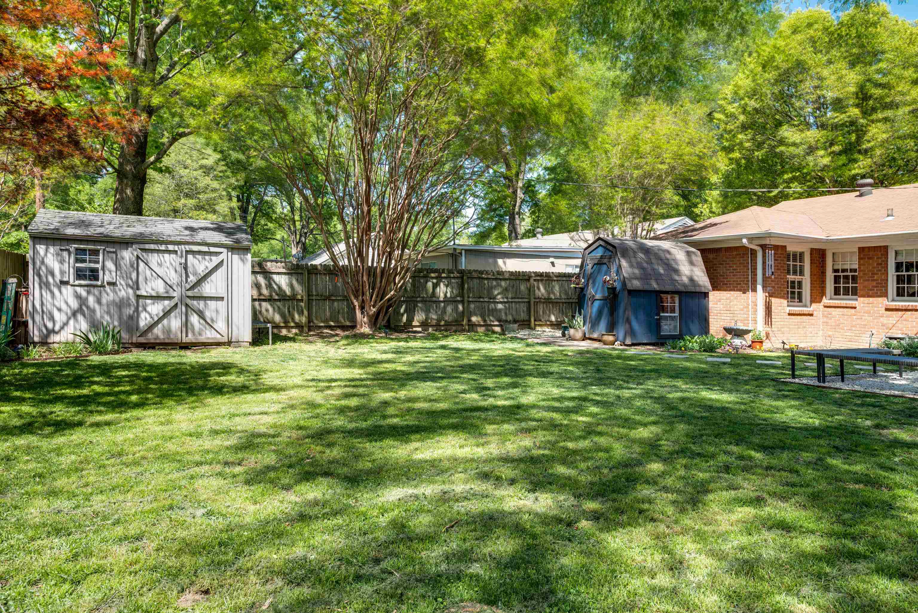 1089 West Perkins Road Memphis, TN 38117 - Photo 25 of 25 a view of a house with a yard porch and sitting area
