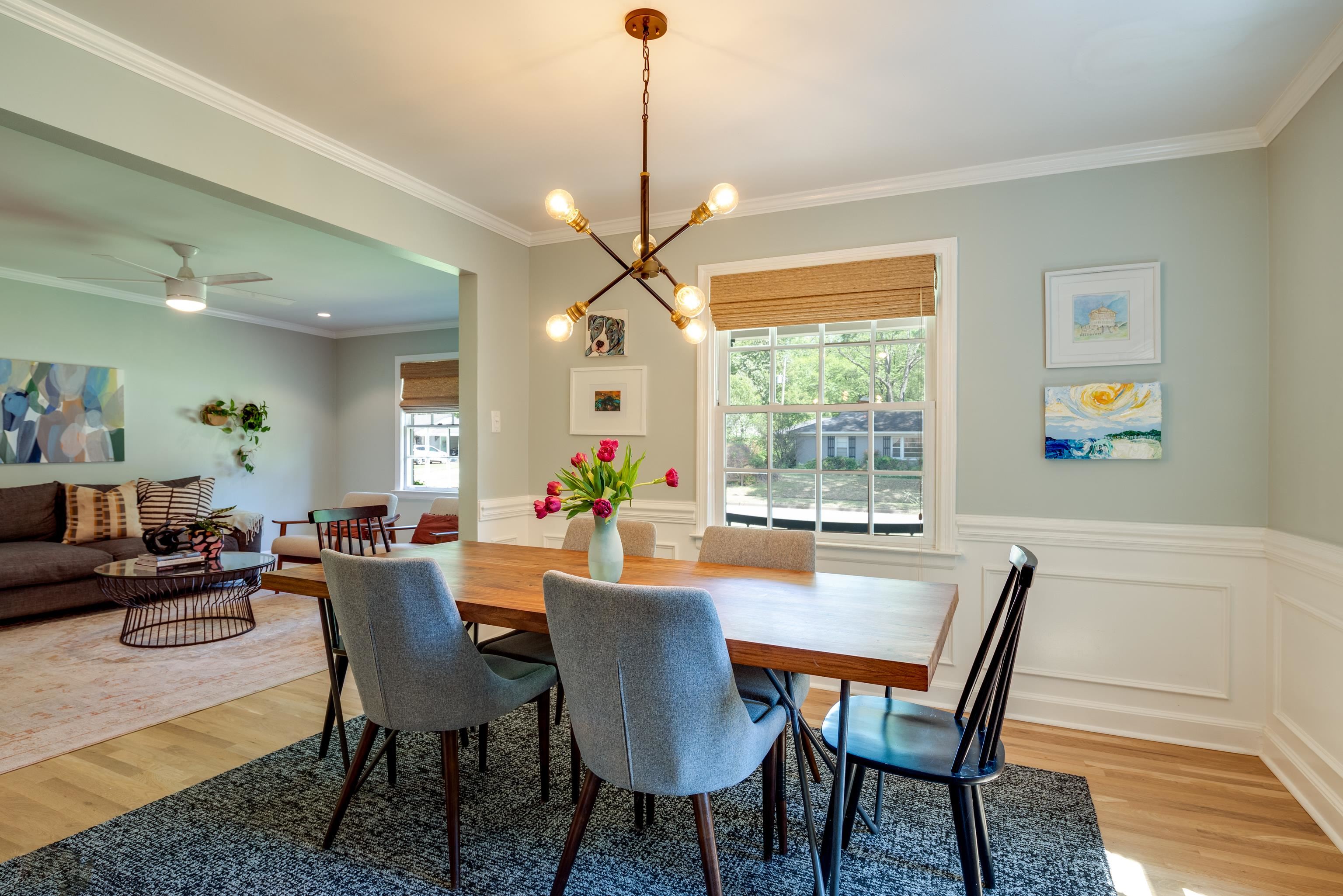 1089 West Perkins Road Memphis, TN 38117 - Photo 7 of 25 a dining room with furniture a chandelier and a rug