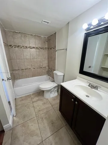 a view of a balcony with chairs