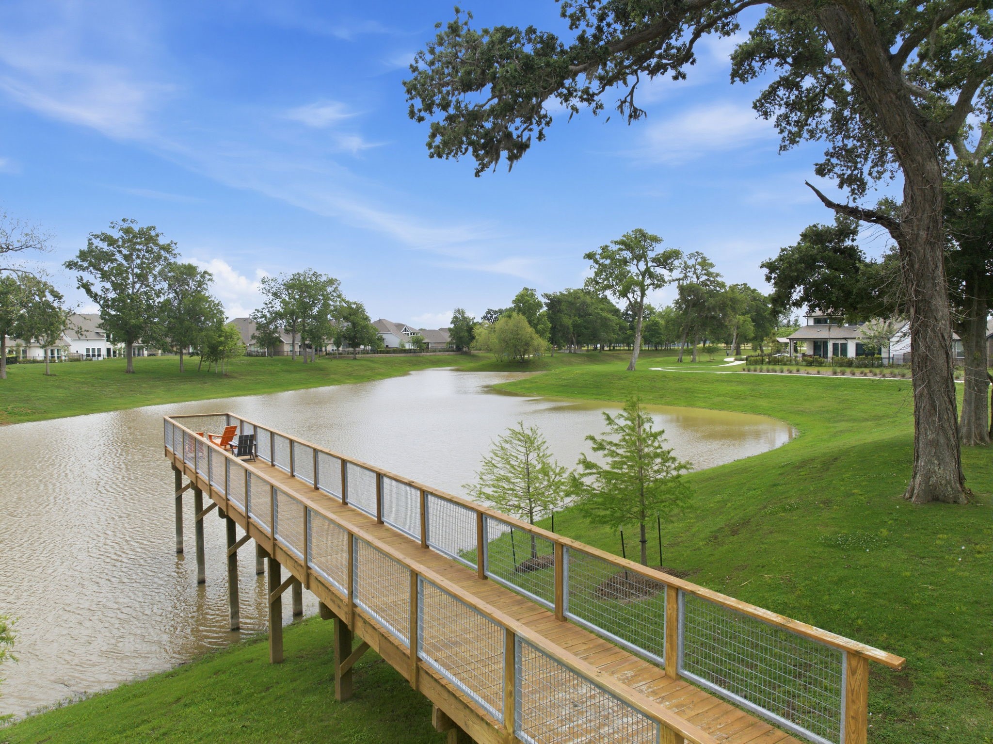 32503 Vly Redstem Way Fulshear, TX 77441 - Photo 14 of 18 a view of a wooden deck and a garden