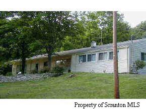 1907 Liberty Park Road Hallstead, PA 18822 - Photo 1 of 1 a view of a house with a yard