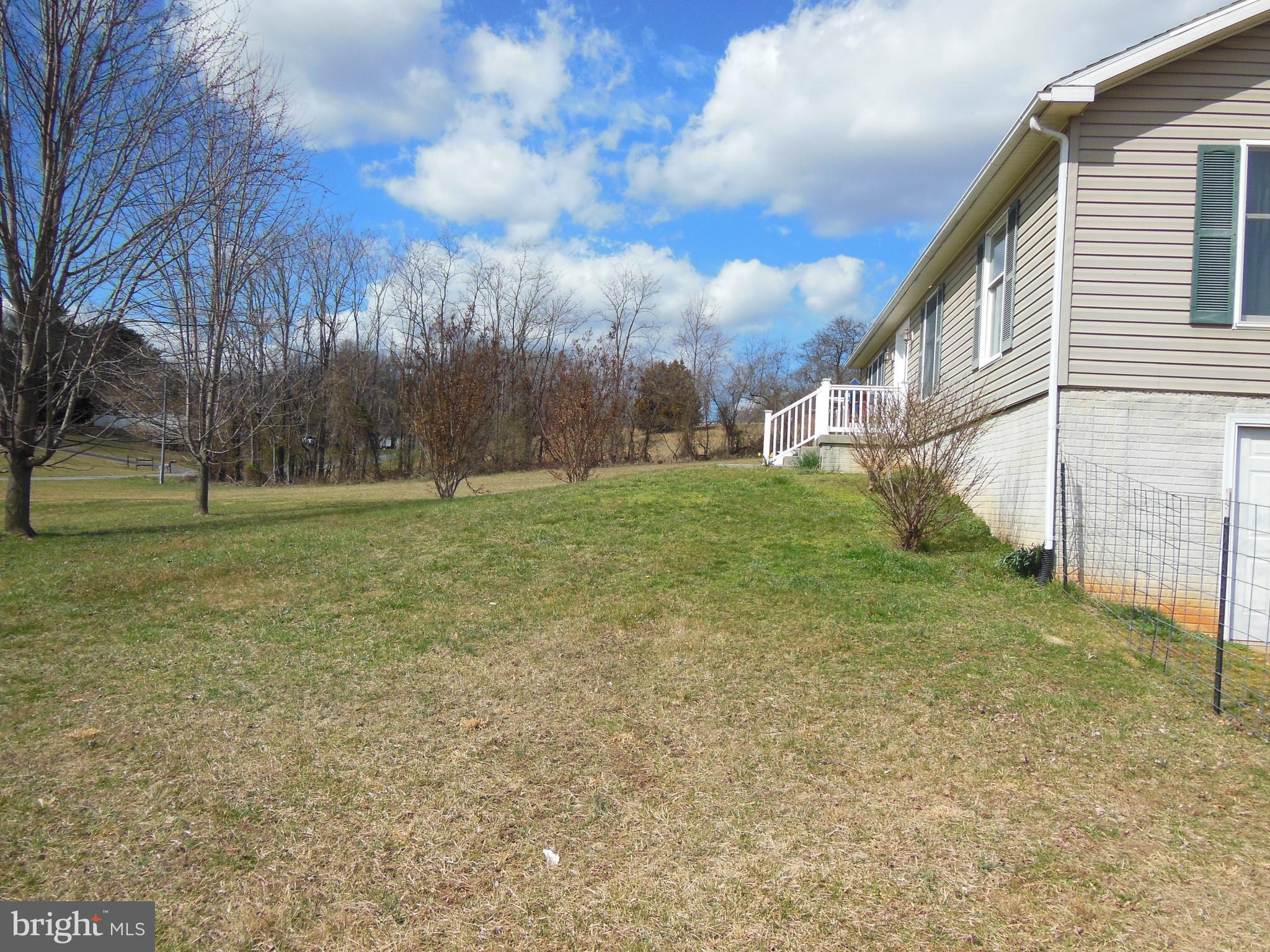 92 Spencers Run Inwood, WV 25428 - Photo 31 of 35 Side View of Front Yard