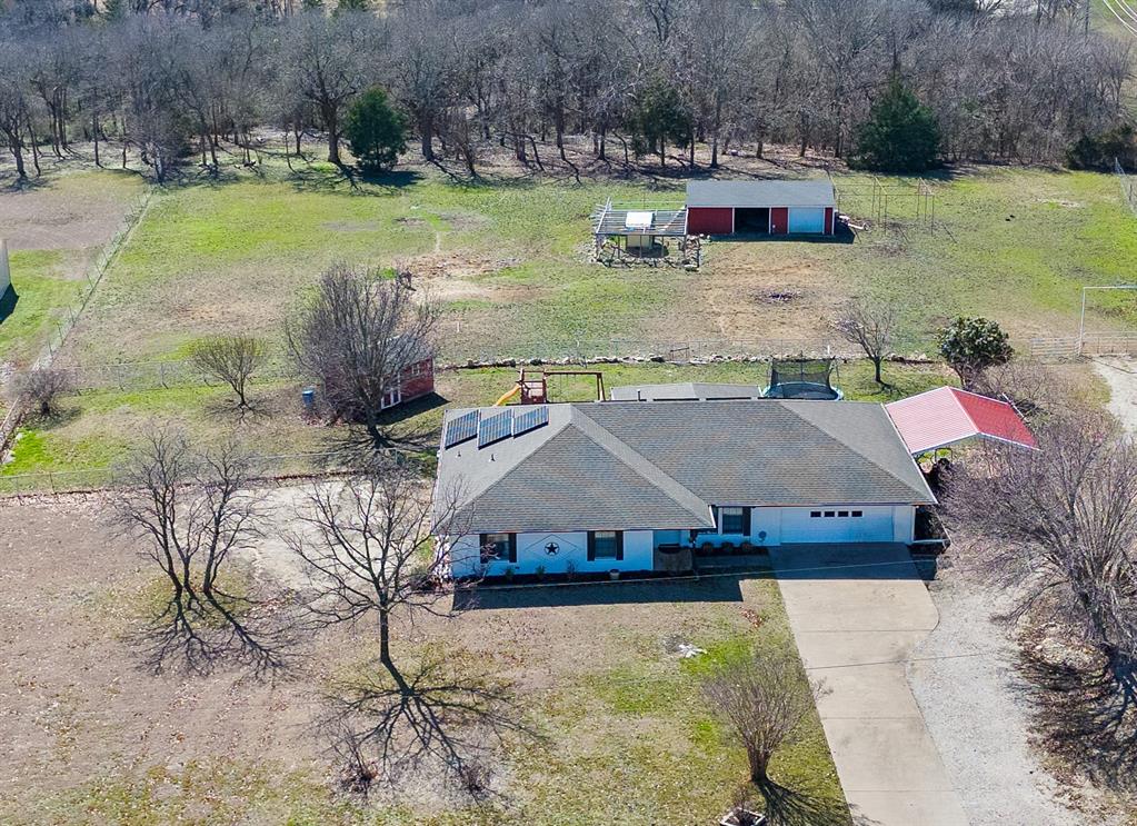 160 County Road 915 Anna, TX 75409 - Photo 1 of 1 a aerial view of a house with swimming pool and a yard