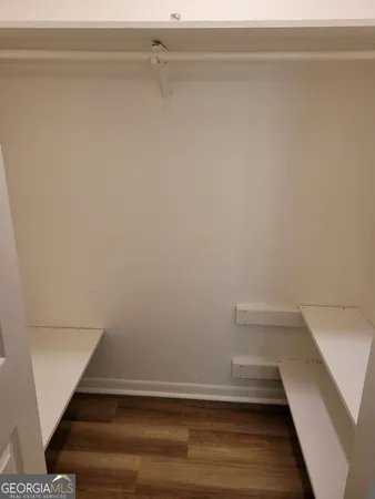 a view of small space with racks on the wall