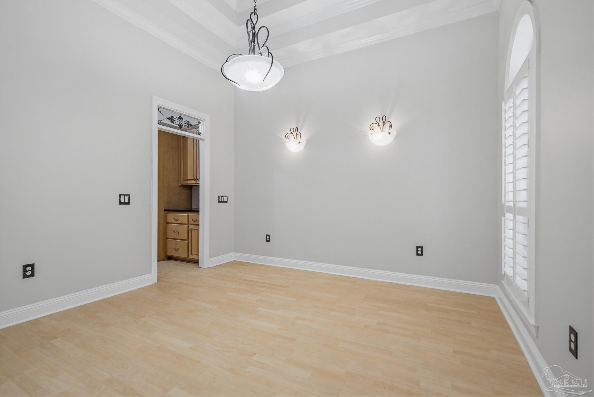 2855 Walling Road Milton, FL 32570 - Photo 14 of 55 a view of an empty room with a chandelier fan
