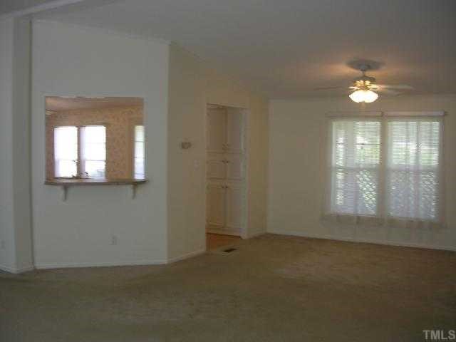 63 Dustin Lane Roxboro, NC 27574 - Photo 5 of 8 an empty room that has a window