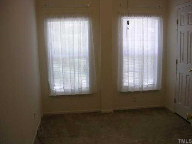 63 Dustin Lane Roxboro, NC 27574 - Photo 8 of 8 a view of an empty room with a window