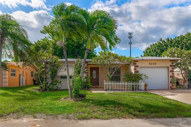 a view of a house with a garden