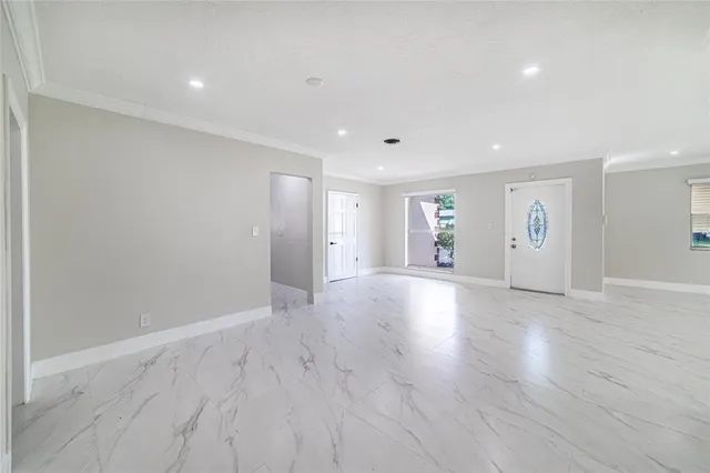 a view of a livingroom with wooden floor