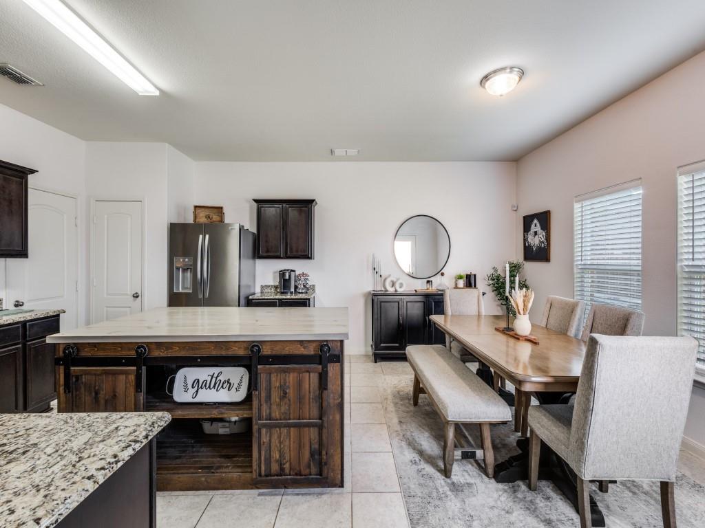 157 Lamont Road Anna, TX 75409 - Photo 11 of 31 a living room with furniture and a wooden floor