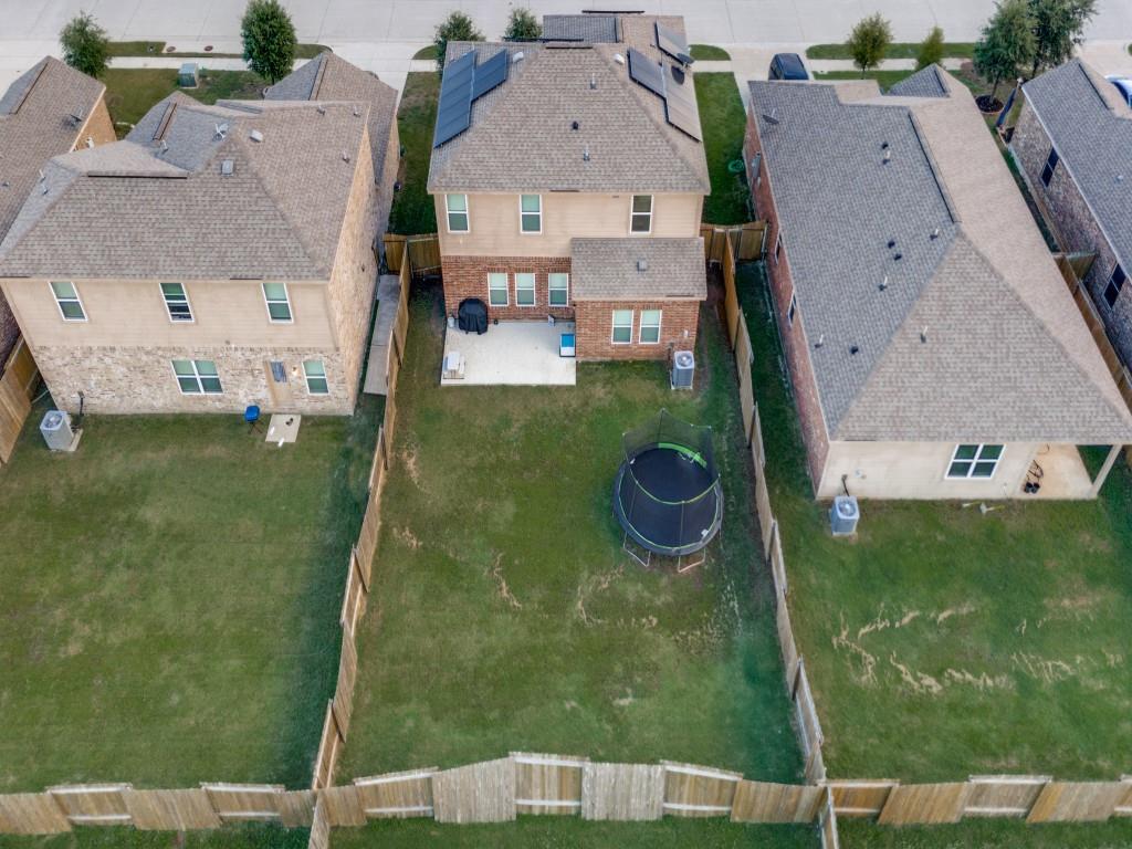 157 Lamont Road Anna, TX 75409 - Photo 27 of 31 an aerial view of residential houses with outdoor space and trees