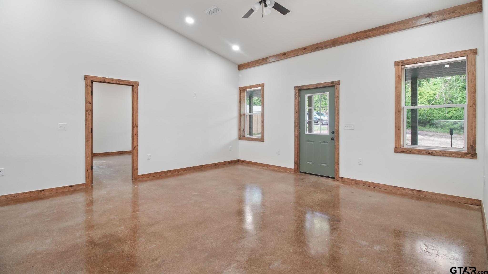 22522 Pine Street Flint, TX 75762 - Photo 12 of 39 a view of an empty room with a window