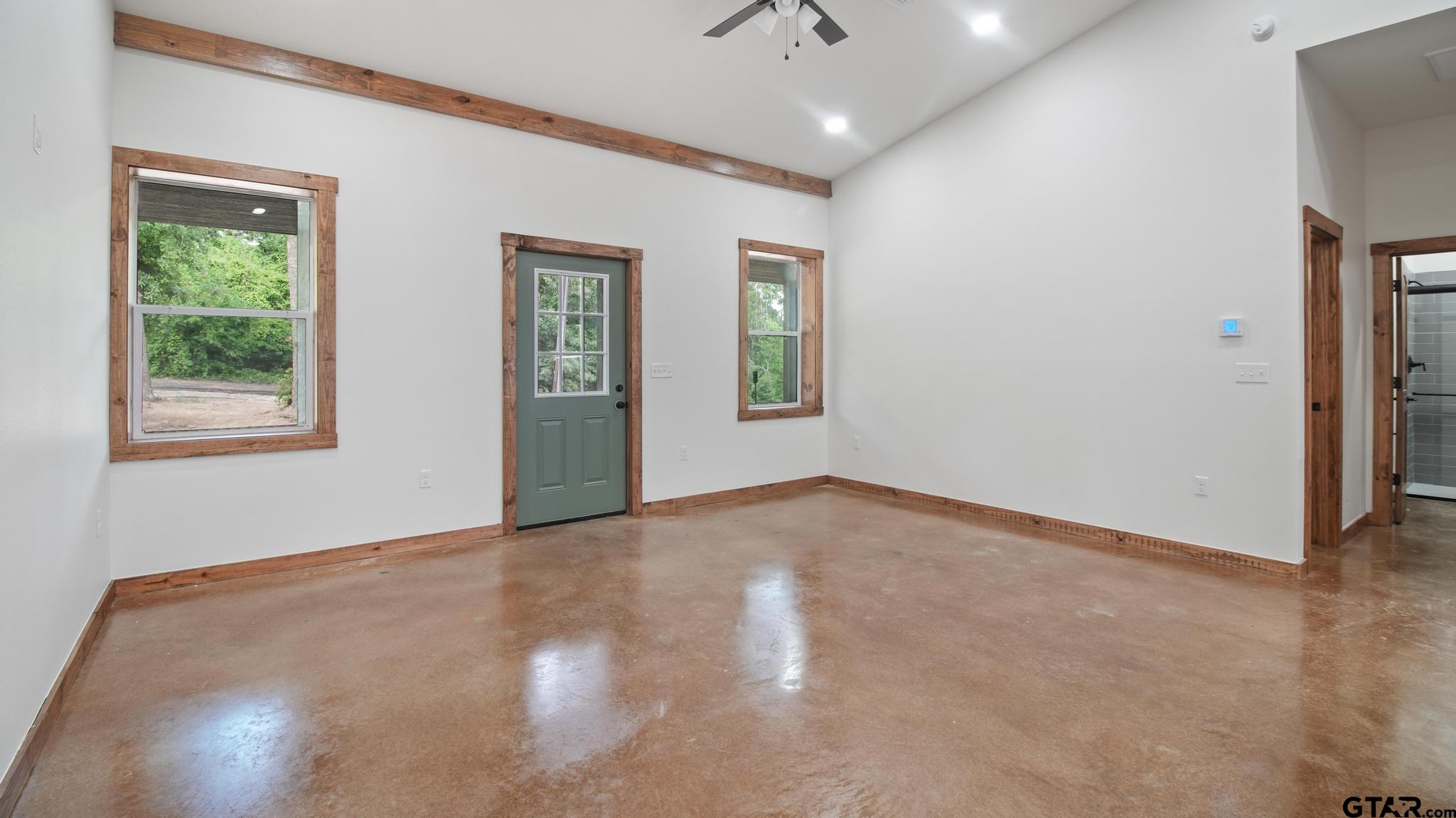 22522 Pine Street Flint, TX 75762 - Photo 13 of 39 an empty room with windows