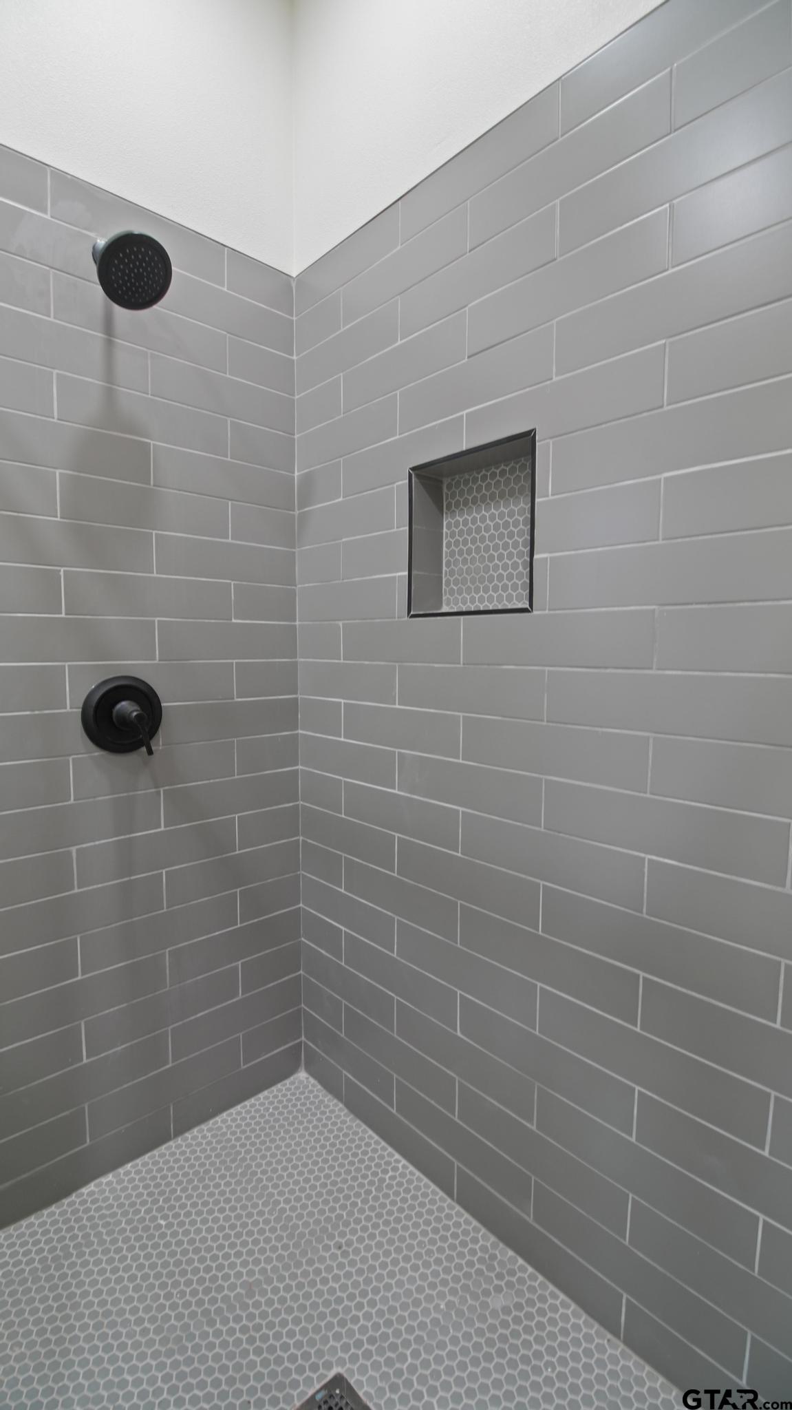 22522 Pine Street Flint, TX 75762 - Photo 19 of 39 a bathroom with a shower
