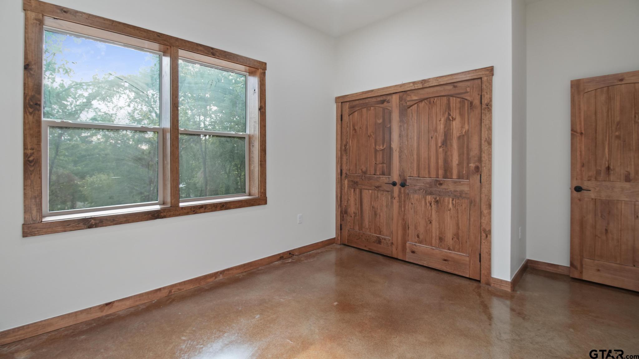 22522 Pine Street Flint, TX 75762 - Photo 24 of 39 an empty room with windows