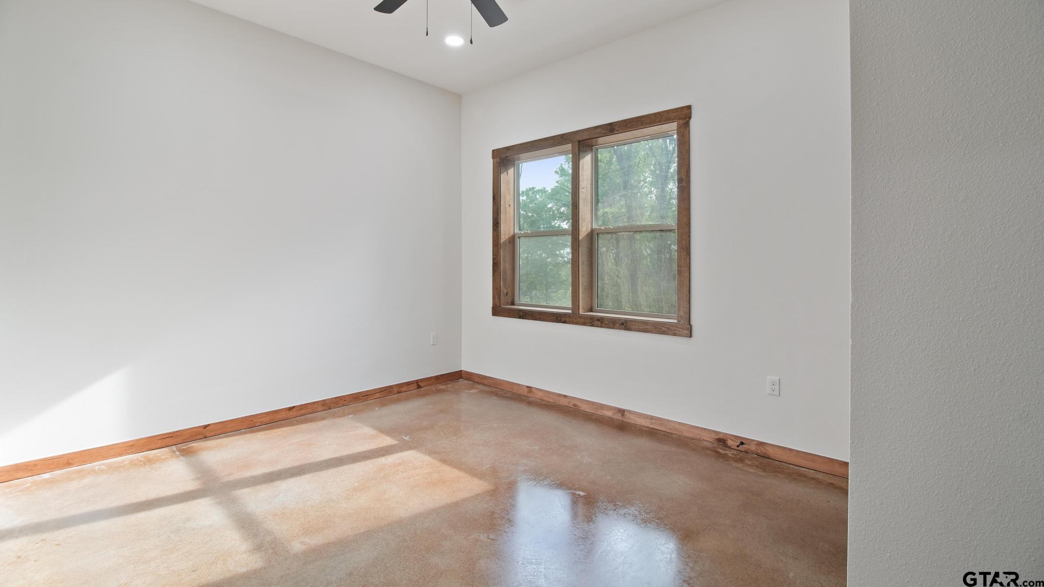 22522 Pine Street Flint, TX 75762 - Photo 25 of 39 a view of an empty room with a window