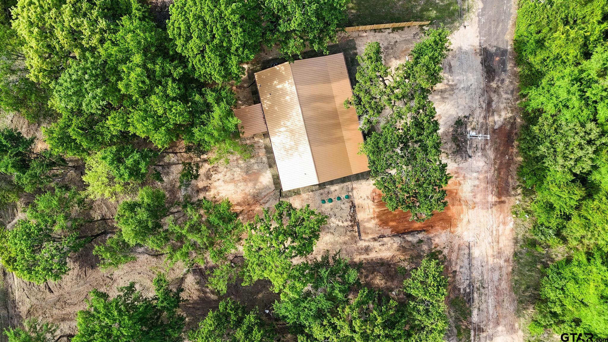 22522 Pine Street Flint, TX 75762 - Photo 34 of 39 an aerial view of a house with a yard and garden