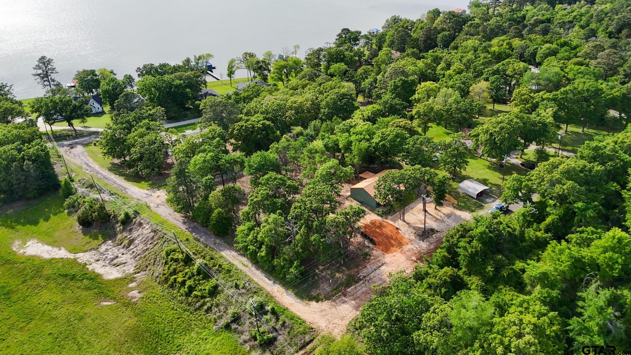 22522 Pine Street Flint, TX 75762 - Photo 35 of 39 an aerial view of residential house with outdoor space and trees all around