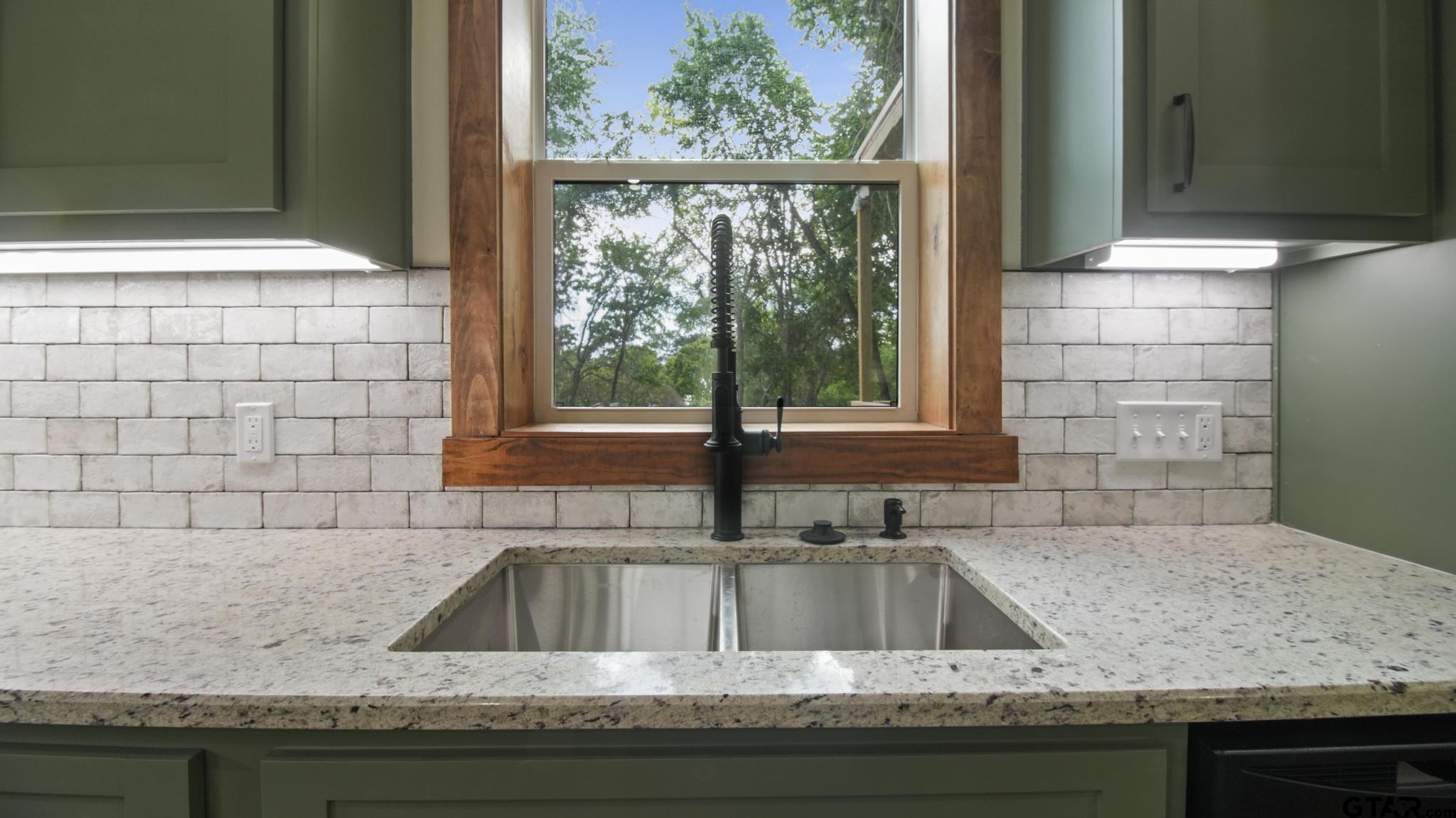 22522 Pine Street Flint, TX 75762 - Photo 10 of 39 a view of a sink and a window