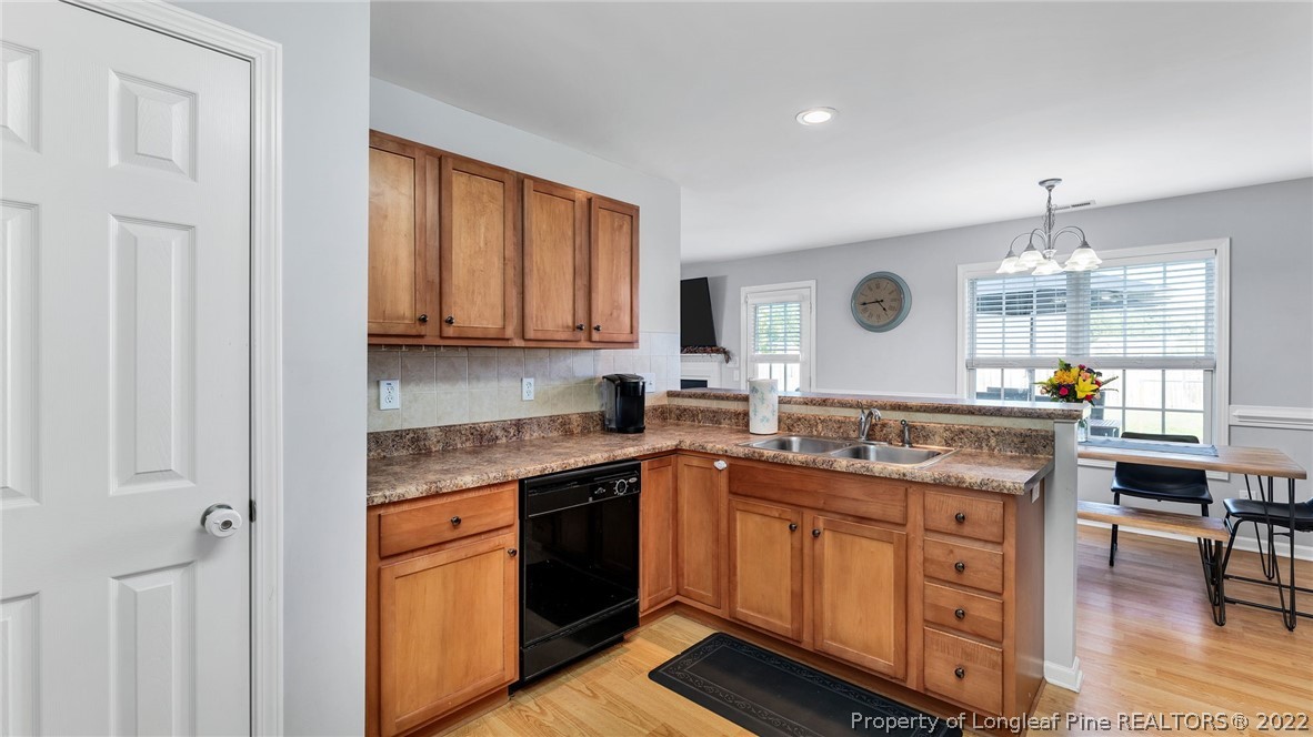 1913 Jenny Road Fayetteville, NC 28314 - Photo 18 of 38 a kitchen with stainless steel appliances granite countertop a stove and cabinets