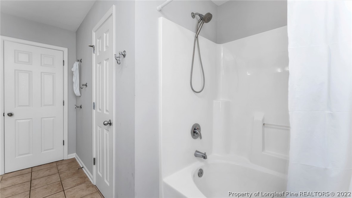 1913 Jenny Road Fayetteville, NC 28314 - Photo 24 of 38 a bathroom with a bathtub