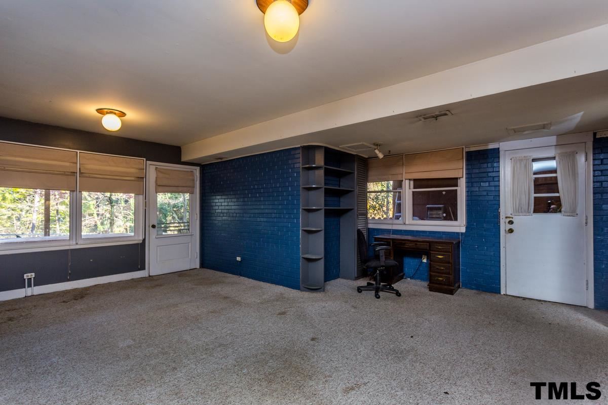 114 Longview Lake Drive Raleigh, NC 27610 - Photo 17 of 25 a view of an empty room with a window