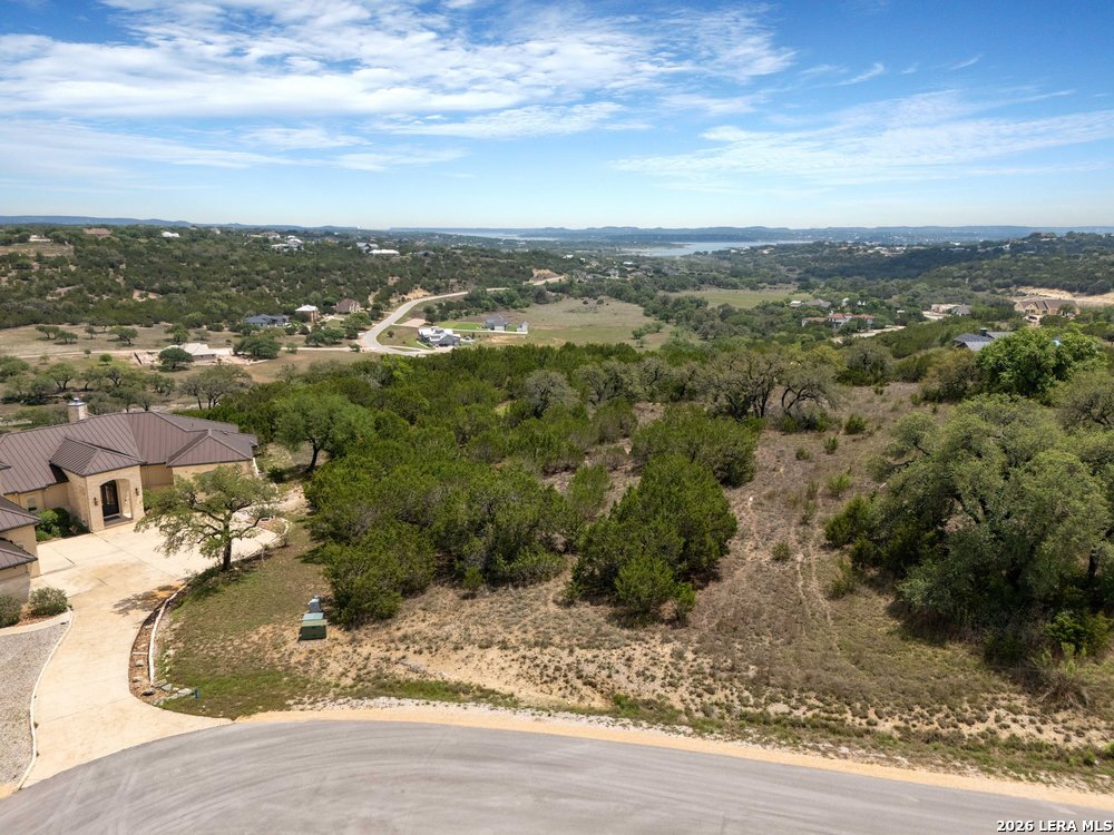 168 Kiwi Lane Spring Branch, TX 78070 - Photo 3 of 8 an aerial view of residential houses with city view