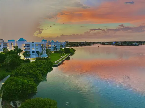a view of a lake with a city
