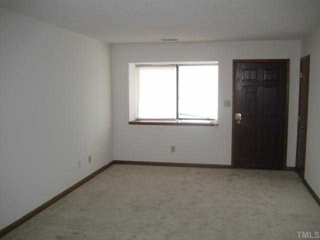 4536 New Hope Road Raleigh, NC 27604 - Photo 3 of 7 an empty room with a window