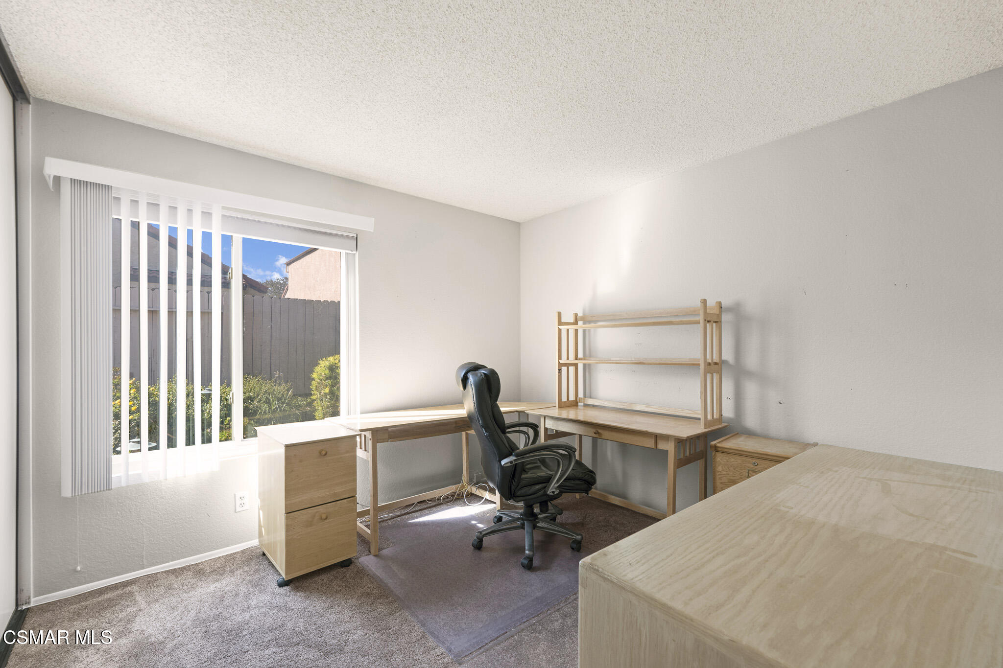 2375 Oak Haven Avenue Simi Valley, CA 93063 - Photo 16 of 34 a view of a workspace with furniture and a window