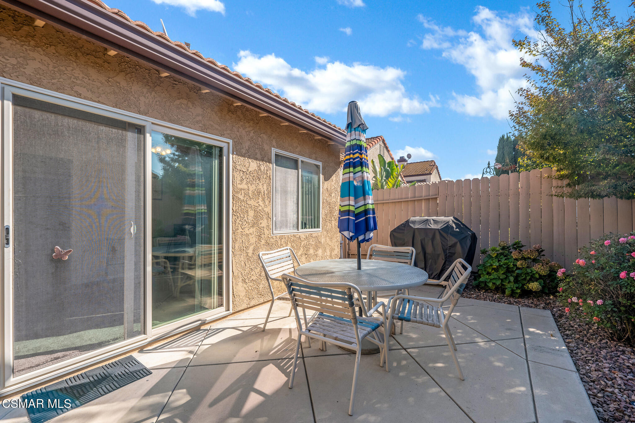 2375 Oak Haven Avenue Simi Valley, CA 93063 - Photo 26 of 34 a patio with table and chairs and potted plants