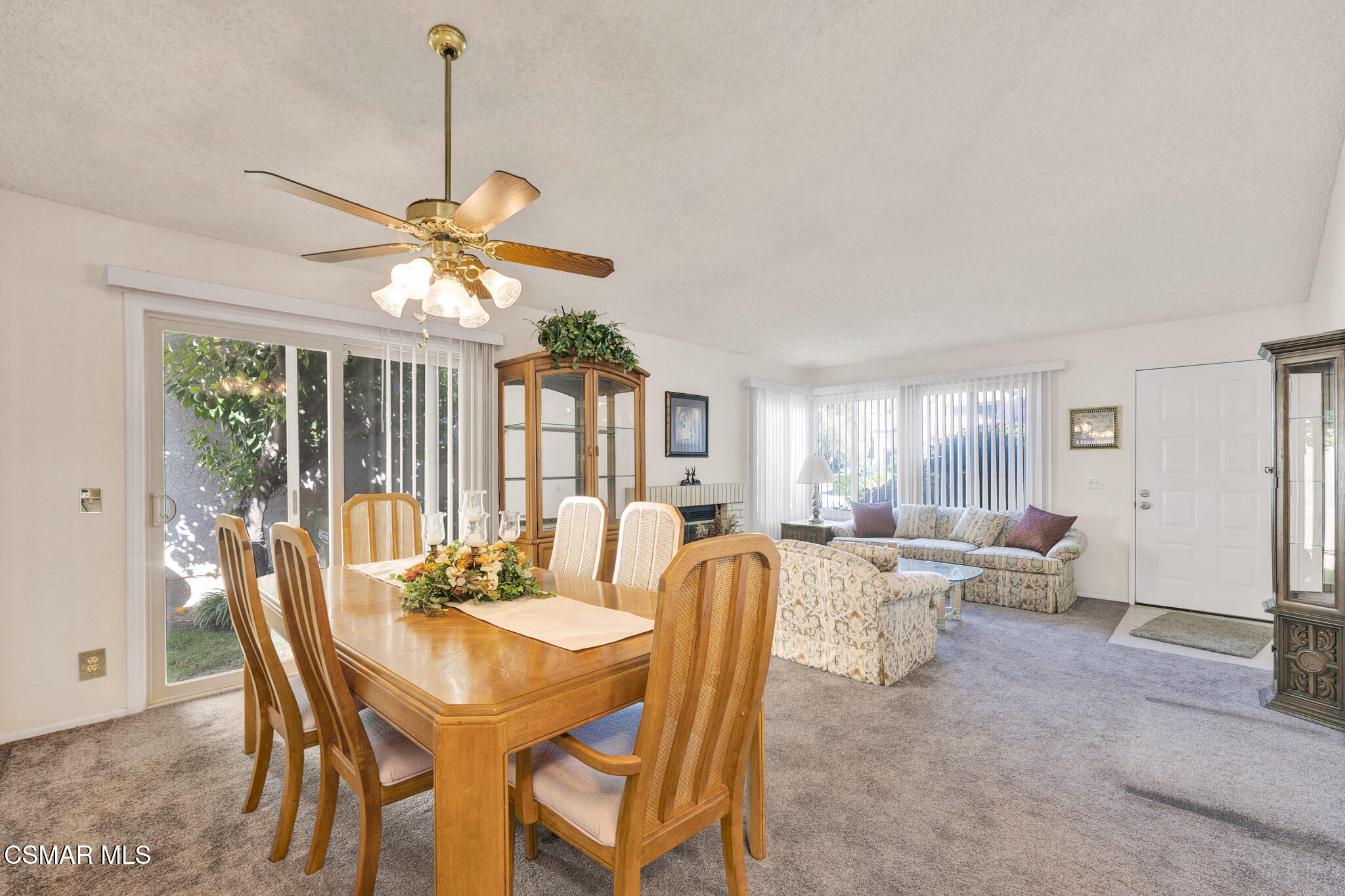 2375 Oak Haven Avenue Simi Valley, CA 93063 - Photo 7 of 34 a view of a dining room with furniture wooden floor and chandelier