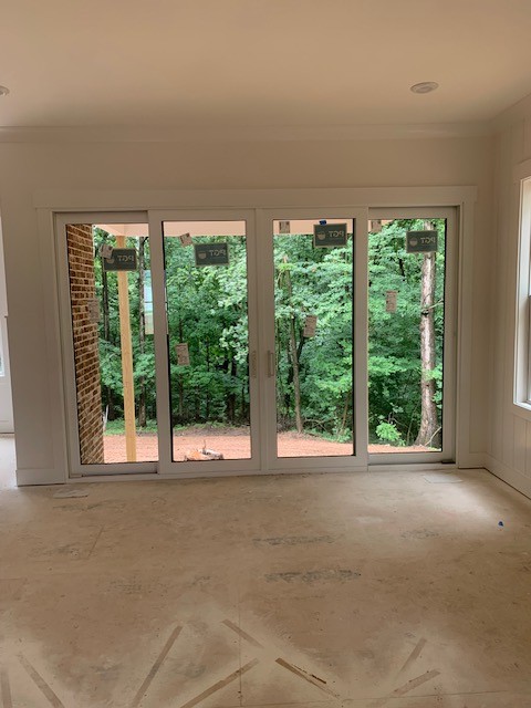 5855 Fisher Grove Road Greenbrier, TN 37073 - Photo 5 of 18 a view of an empty room with a large window