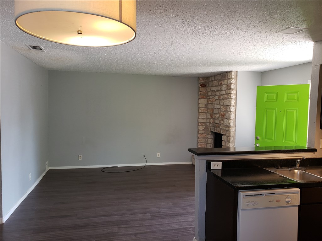 2304 Cedrick Cove, Unit B Austin, TX 78748 - Photo 2 of 7 a room with a sink and a mirror
