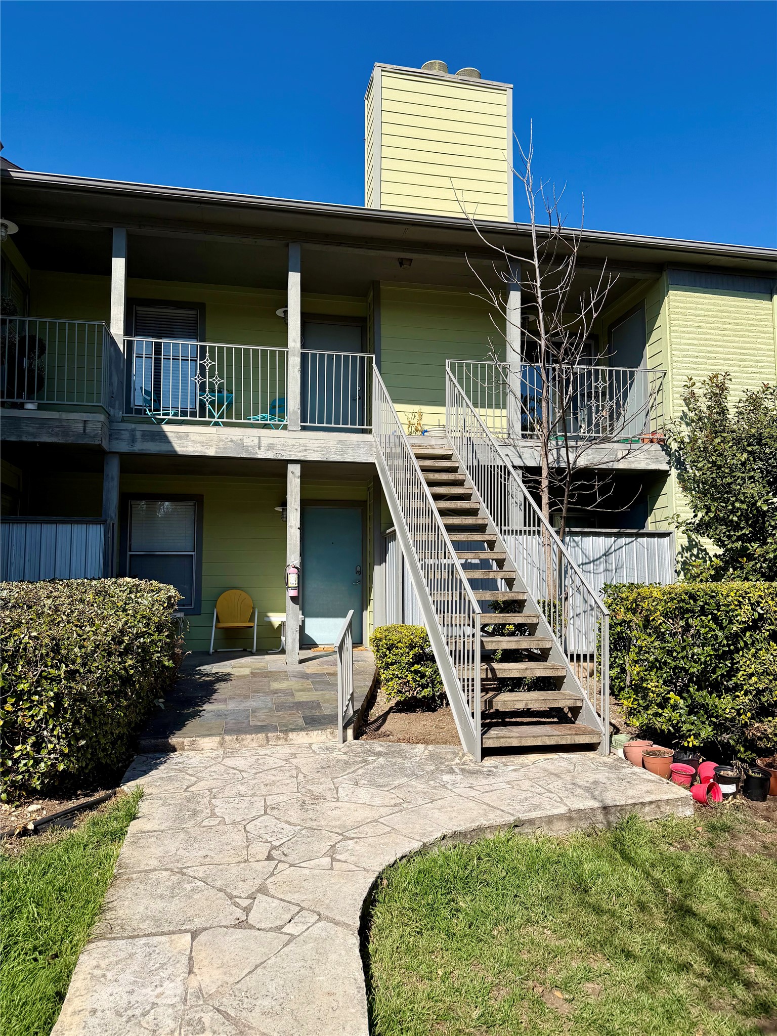 3204 Menchaca Road, Unit 204 Austin, TX 78704 - Photo 2 of 18 View of building exterior with stairs